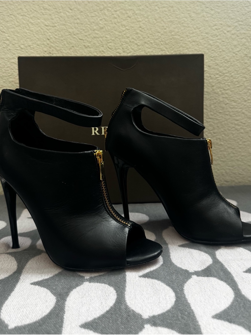 Renvy Black Peep-Toe Ankle Booties with Gold Zipper Accent
